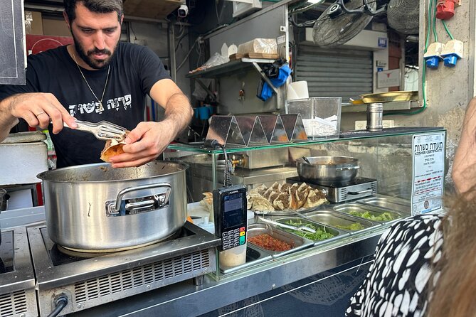 Tel Aviv: Carmel Market Food Tasting Tour “Shuk Hacarmel” - Hummus, falafel and sabich form the familiar core